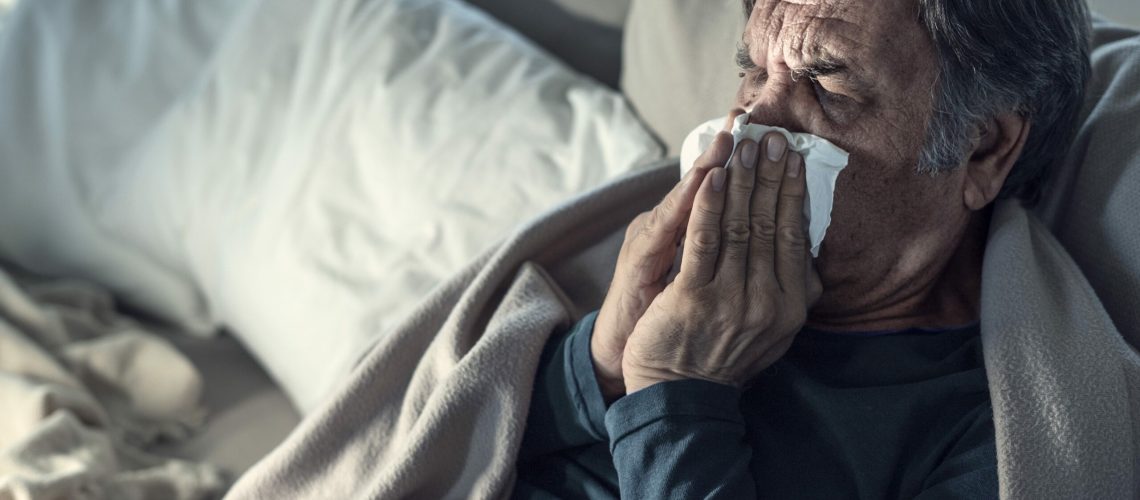 Senior man suffering from cold