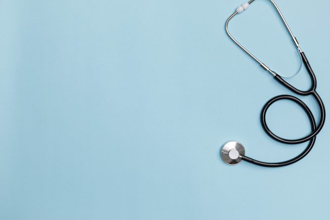 Creative flatlay of doctor medical equipment blue table with stethoscope, Health care concept, Top view with copy space, Isolated on blue